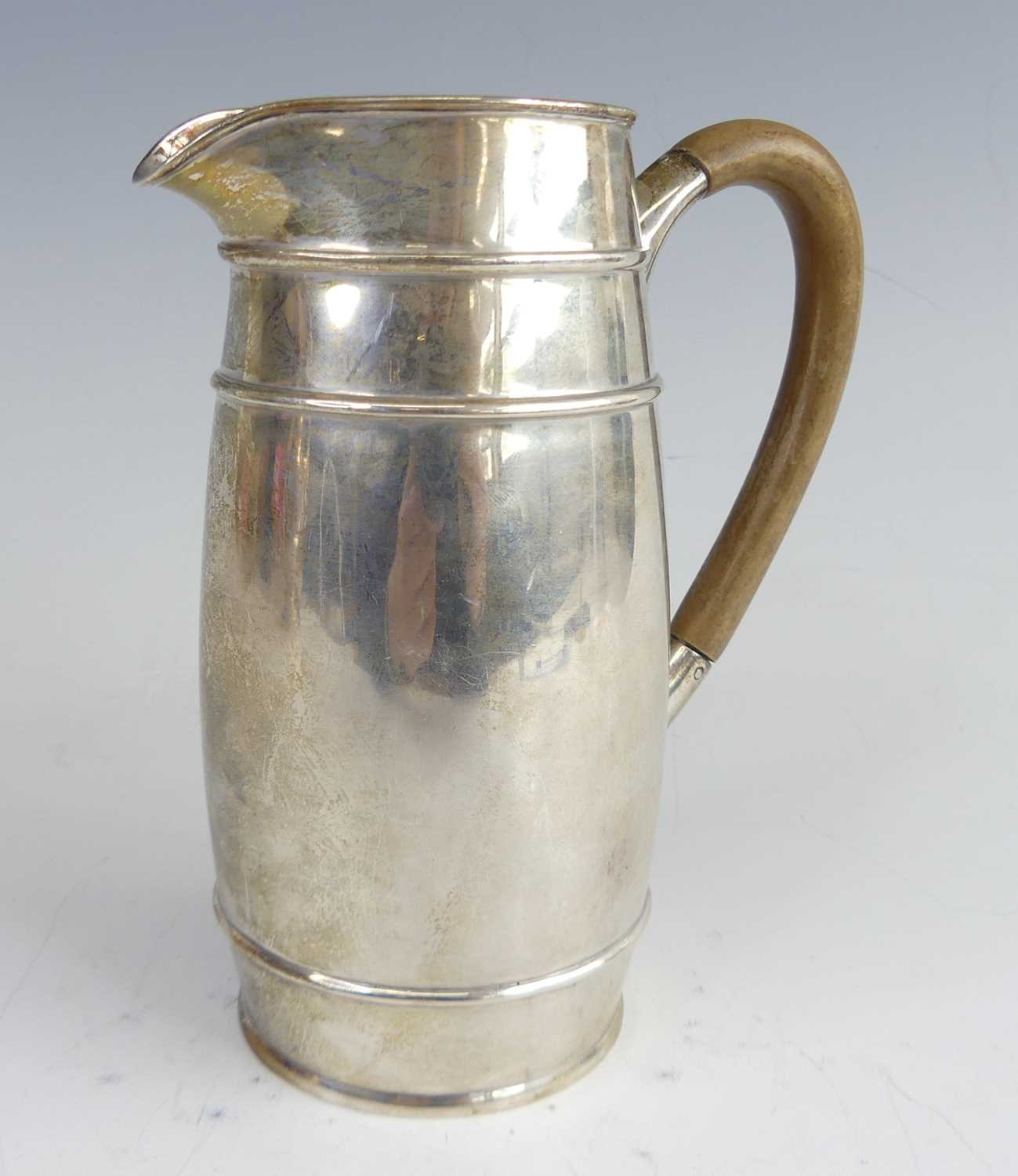 Lot 2073 - A George V silver milk jug, of tall barrel...
