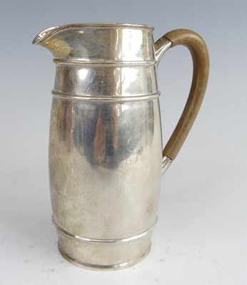 Lot 2073 - A George V silver milk jug, of tall barrel...