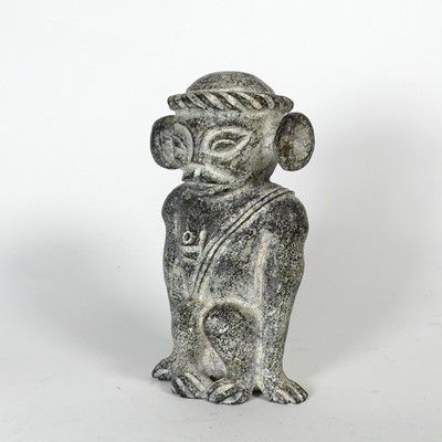 Lot 1 - An African carved stone Nomoli figure,...