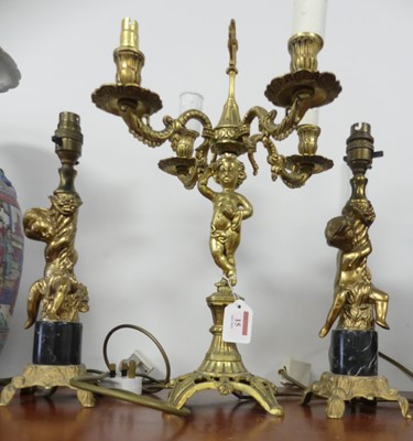 Lot 15 - A brass four-branch figural table lamp in the...
