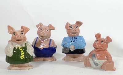 Lot 18 - A group of four Wade piggy-banks, the largest...