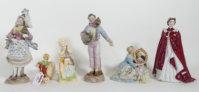 Lot 44 - A pair of German porcelain figures, of a lady...
