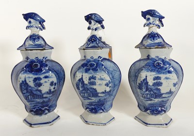 Lot 45 - A matched set of three Delft tin-glazed...