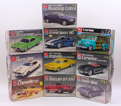 Lot 604 - A collection of ten boxed AMT ERTL 1/25 scale...