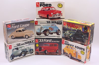 Lot 610 - Seven boxed AMT/ERTL 1/25 scale plastic kits,...