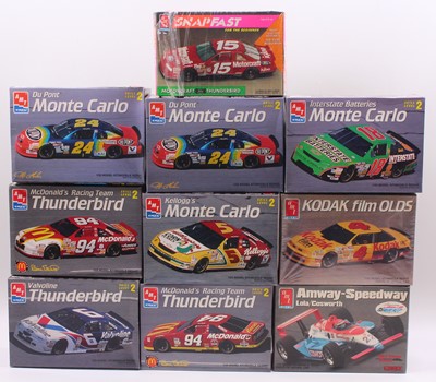 Lot 611 - A collection of ten boxed AMT/ERTL 1/25 scale...