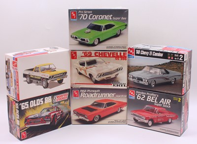 Lot 615 - A collection of seven boxed AMT/Ertl 1/25...