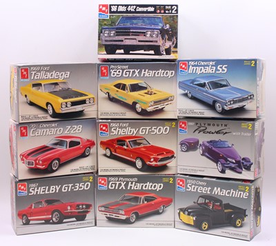 Lot 616 - A collection of ten boxed AMT/ERTL 1/25 scale...
