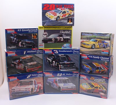 Lot 619 - A collection of ten boxed Monogram 1/24 scale...