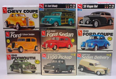 Lot 621 - A collection of nine boxed AMT/Ertl 1/25 scale...