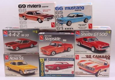 Lot 623 - A collection of 8 boxed AMT/Ertl 1/25 scale...