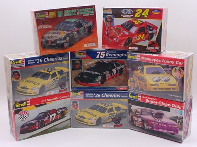 Lot 628 - A collection of eight boxed Revell Nascar and...