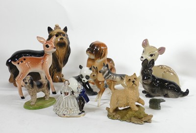 Lot 65 - A collection of figures of animals to include...