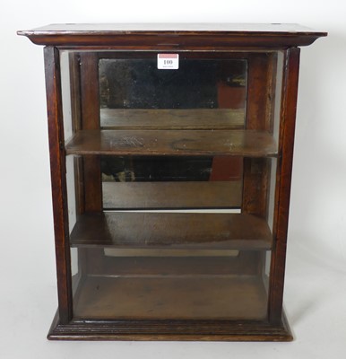 Lot 100 - A 19th century oak glazed table-top display...