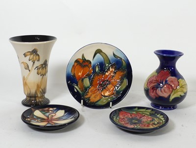 Lot 122 - A collection of Moorcroft pottery, to include...
