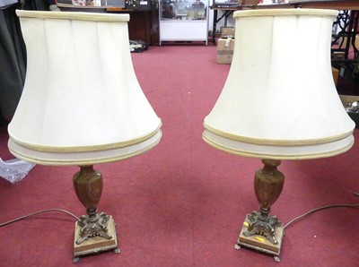 Lot 140 - A pair of metal mounted onyx table lamps and...