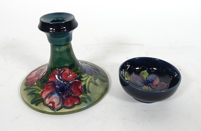 Lot 143 - A Moorcroft pottery chamber stick in the...