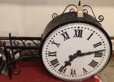 Lot 1141 - A large double-sided exterior mounted wall...