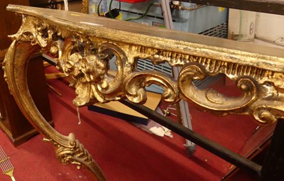 Lot 1151 - A French floral gilt serpentine front console...