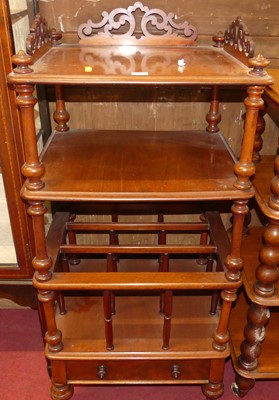 Lot 1157 - A mid-Victorian walnut canterbury whatnot,...