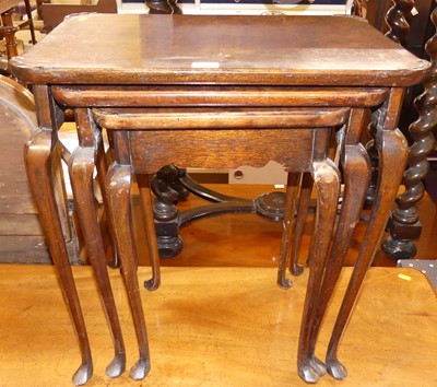 Lot 1158 - A figured walnut and walnut nest of three...