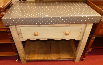 Lot 1161 - A rustic pine kitchen butcher's block, having...