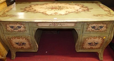Lot 1169 - A French floral painted kneehole writing desk,...