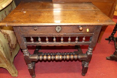 Lot 1172 - An 18th century joined oak single drawer side...