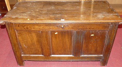 Lot 1179 - An 18th century joined oak three panelled...