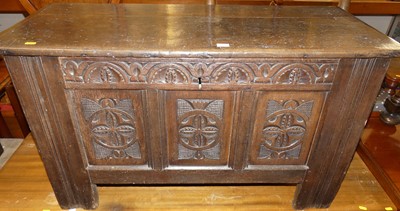 Lot 1188 - An antique joined oak and later floral relief...
