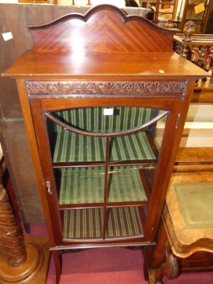 Lot 1205 - An Edwardian mahogany ledgeback single door...