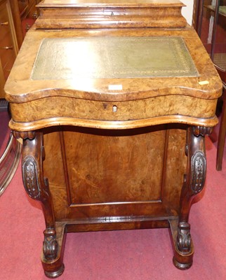 Lot 1206 - A mid-Victorian figured walnut slopefront...