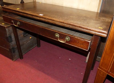 Lot 1211 - An early 19th century mahogany fold-over tea...
