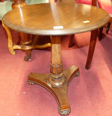 Lot 1238 - A Victorian rosewood circular fixed pedestal...