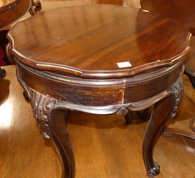 Lot 1239 - An early 20th century walnut circular...
