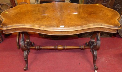 Lot 1245 - A mid-Victorian figured walnut shaped top hall...