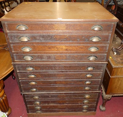Lot 1249 - An early 20th century oak three-section plan...