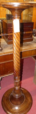 Lot 1254 - A mahogany spiral reeded acanthus leaf carved...