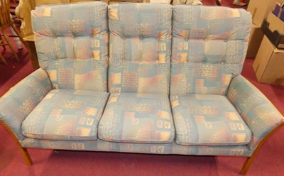 Lot 1269 - A contemporary Ercol blond elm framed and...