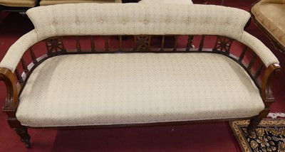 Lot 1273 - A late Victorian walnut framed and pale fabric...