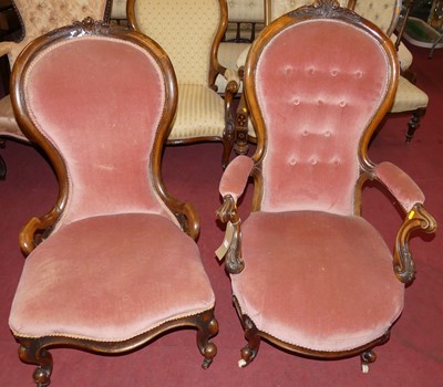Lot 1276 - A pair of mid-Victorian floral carved mahogany...