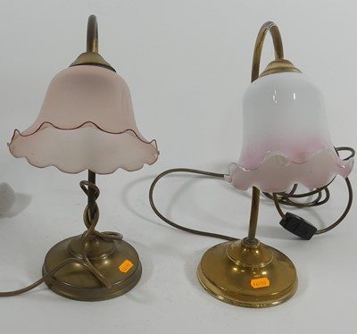 Lot 145 - A near pair of Edwardian style brass table...