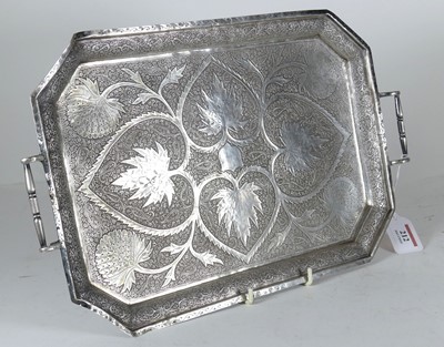 Lot 212 - A Persian white metal tray of canted...