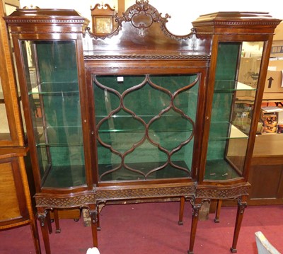 Lot 1300 - An Edwardian mahogany three-door glazed china...