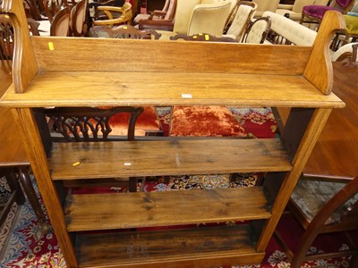Lot 1306 - An oak freestanding open bookshelf, w.112cm