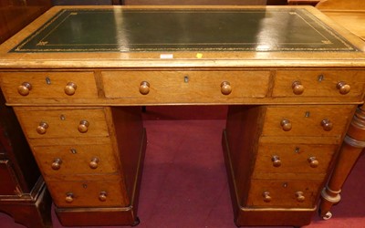 Lot 1310 - A mid-Victorian oak round cornered and...
