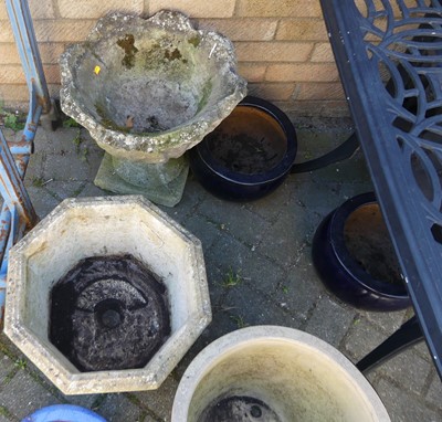 Lot 1324 - Two reconstituted stone garden planters, and...