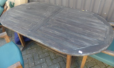 Lot 1329 - A contemporary slatted teak patio suite,...