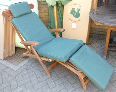 Lot 1330 - A pair of contemporary slatted teak folding...