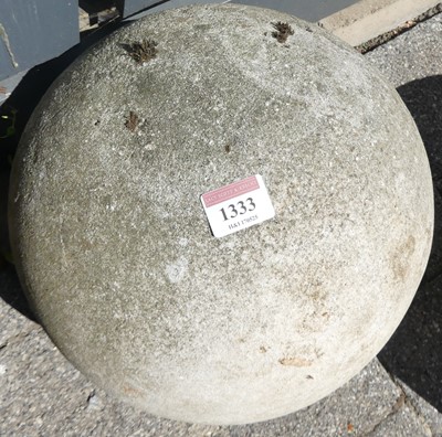 Lot 1333 - A reconstituted stone garden sphere, dia. 29cm